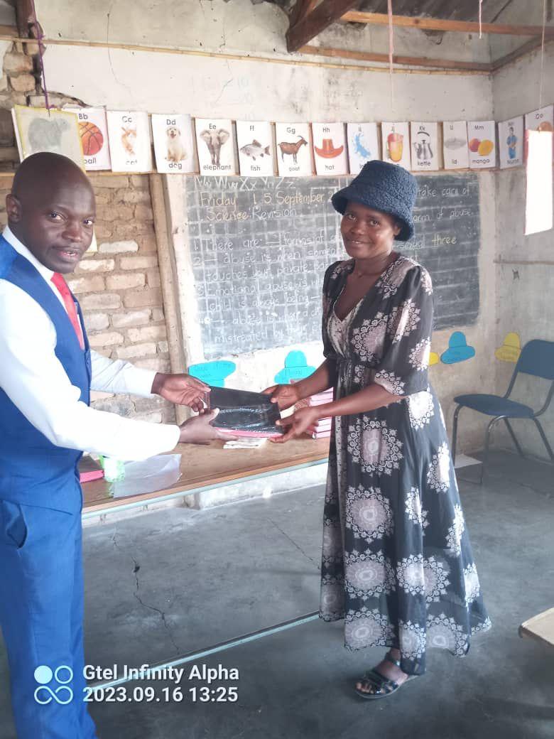 Saints receiving bibles in Mutare.